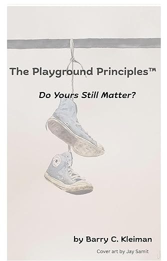 A pair of gray Converse sneakers hang by their laces over a wire on the cover of the book The Playground Principlesā¢: Do Yours Still Matter? by Barry C. Kleiman, with cover art by Jay Samit.
