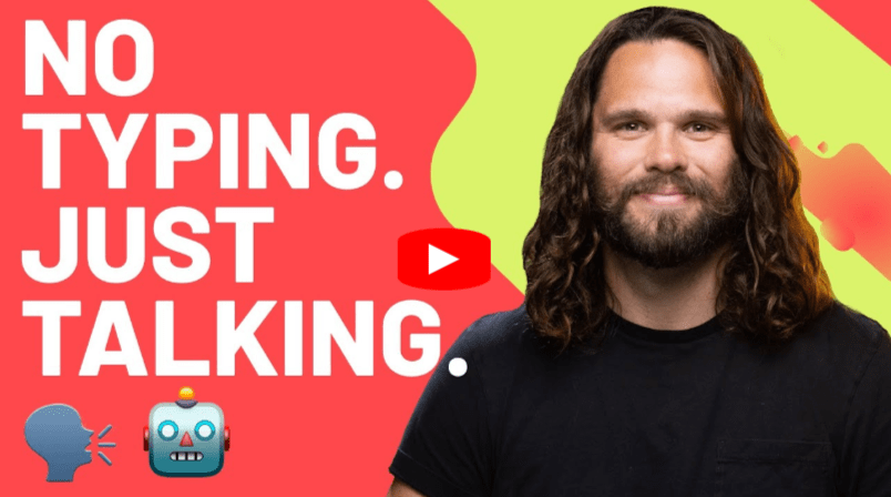 A man with long brown hair and a beard smiles against a red and yellow background. Text reads NO TYPING. JUST TALKING. with speech and robot emojis, and a YouTube play button in the center.