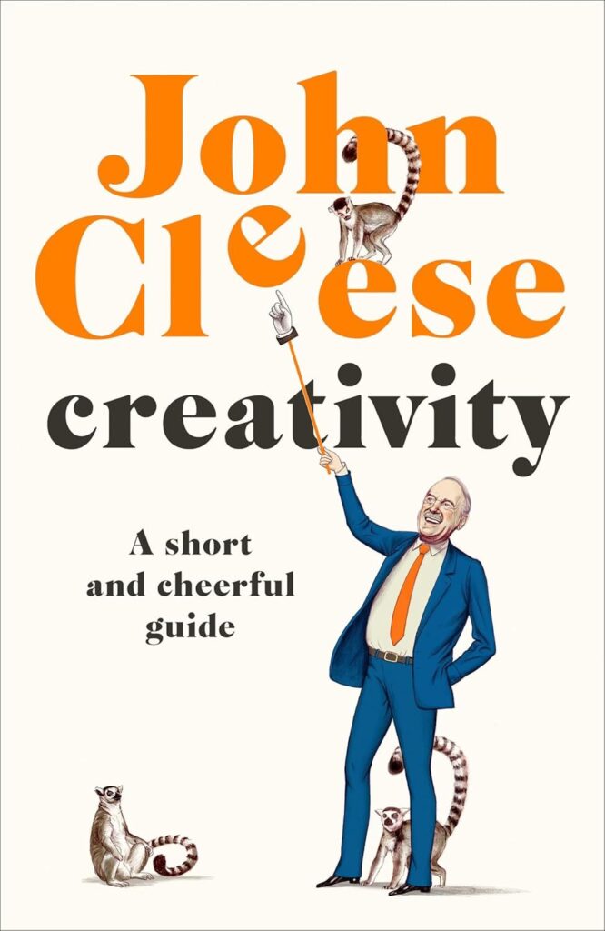 Book cover for Creativity by John Cleese. An illustrated man in a suit holds a lemur on a stick, with two more lemurs nearby. The subtitle reads, A short and cheerful guide.